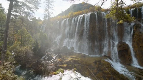 View of the Nuo Ri Lang Waterfall (Nuorilang) Stock Footage 126085879
