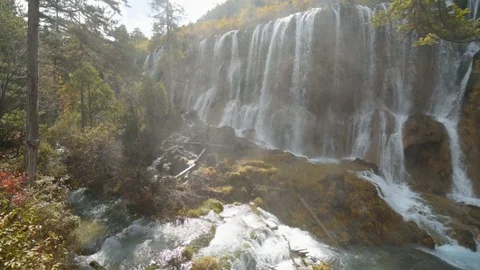 View of the Nuo Ri Lang Waterfall (Nuorilang) Stock Footage 126089548
