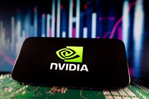 View of NVIDIA logo on smartphone screen with financial charts. Toronto, Canada Foto stock