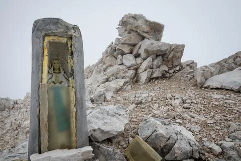 View obscured by clouds from the top of the Cima di Mezzo mountain (3154 m).. Stock Photos