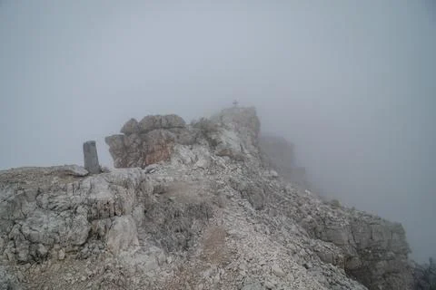View obscured by clouds from the top of Cima di Mezzo (3154 m). Stock Photos