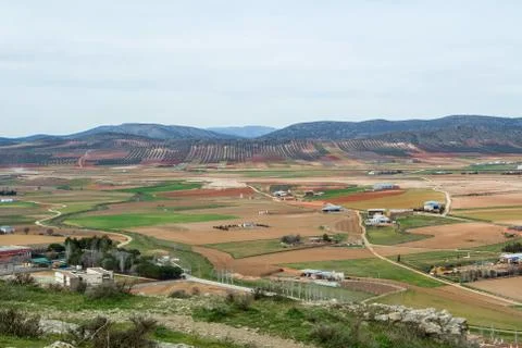 A view from observation deck to fields, farms and mountains near Consuegra .. Stock Photos