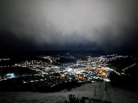 View from the observation deck of a small town in the light of night lights Stock Photos