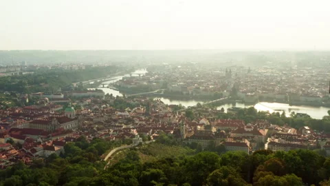 View from observation tower overlooks historic Prague cityscape along river 動画素材 341338575