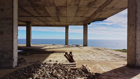 View of the ocean from an abandoned structure on the coast Stock Footage 325091465