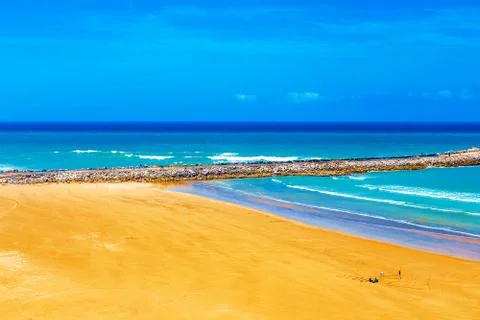 View of the ocean and the breakwaters that separate the mouth of the Bou Regr Stock Photos