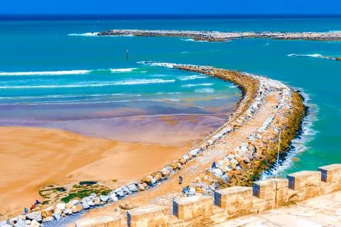 View of the ocean and the breakwaters that separate the mouth of the Bou Regr Stock Photos