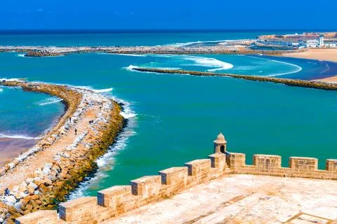 View of the ocean and the breakwaters that separate the mouth of the Bou Regr Stock Photos