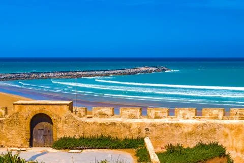View of the ocean and the breakwaters that separate the mouth of the Bou Regr Foto stock