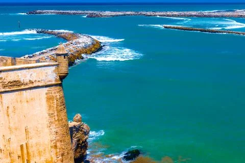View of the ocean and the breakwaters that separate the mouth of the Bou Regr Stock Photos