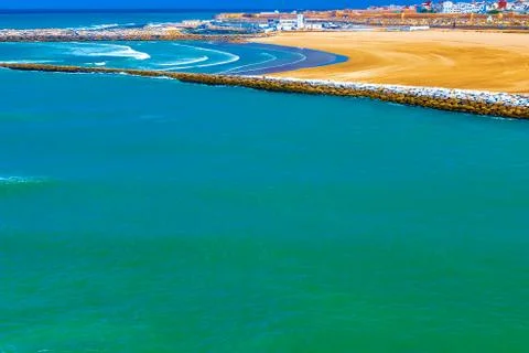 View of the ocean and the breakwaters that separate the mouth of the Bou Regr Stock Photos