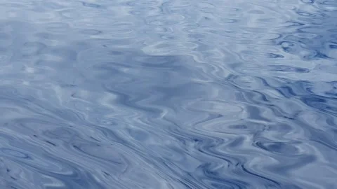 View of ocean currents and waves with a background of sky and clouds Stock Footage 297029511