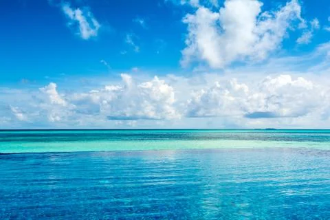 View to the ocean from infinity pool on the shores of the Indian Ocean Stock Photos