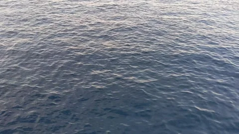 The view of the ocean that looks like it is glowing in Indonesia Stock Footage 292499080