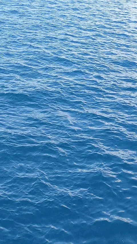 The view of the ocean that looks like it is glowing in Indonesia Video stock 292508460
