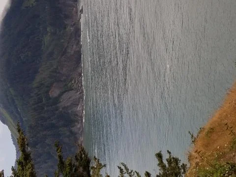 View of ocean mountains Stock Photos