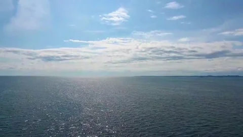 View of the ocean under a clear sky during a boat trip in Norway in summer 20 Stock Footage 340202124
