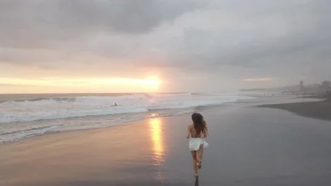 View On Ocean With Waves And Rocks And Yellow Red Amazing Sunset Stock Footage 146692709