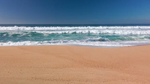 View of the Ocean Waves from Sandy Beach, sunny day Stock Footage 123019709