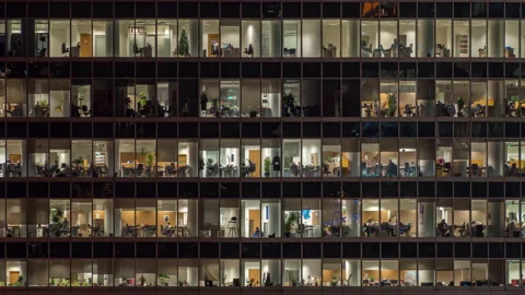 View of office windows with working people 動画素材 163787867