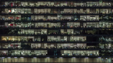 View of office windows with working people Stock Footage 169210118