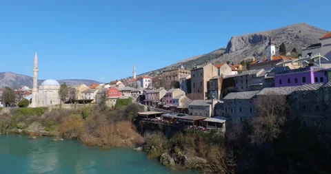 View of the Old Bridge in Mostar city during sunny day Stock Footage 233027688