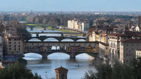 View of the Old Bridge or 'Ponte Vecchio' over the river Arno in Florence Stock Footage 168296681