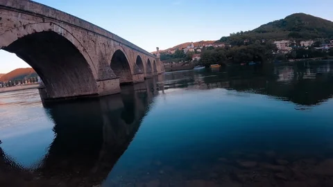 View to the Old Bridge from river Drina in Visegrad. Video stock 166245502