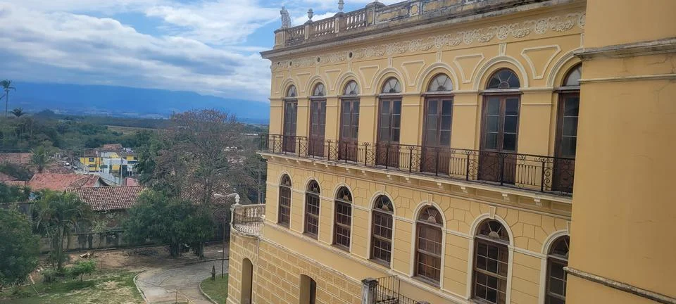 View of old building with window and period colors Stock Photos