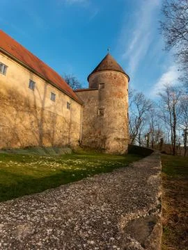 View on the old castle elements at the spring tower door window handle Stock Photos