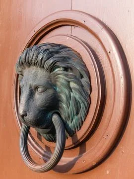 View on the old castle elements at the spring tower door window handle 库存照片