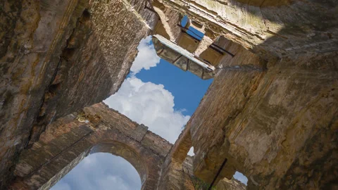 View from old castle tower to cloudy sky time lapse scene Video stock 159280166