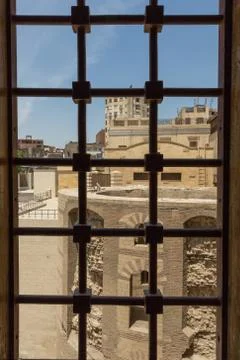 View of an old church through a window Stock Photos
