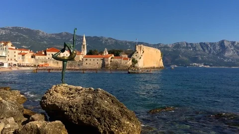 View of Old District of Budva and Statue of Ballerina Dancing girl, Montenegro Stock Footage 120827524