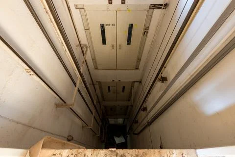View into an old elevator shaft 写真素材
