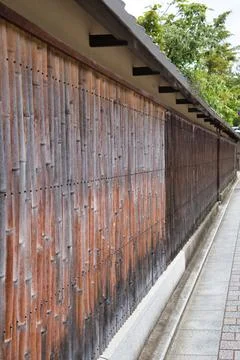 A view of the old-fashioned wall made with bamboo.  Kyoto Japan Stock Photos