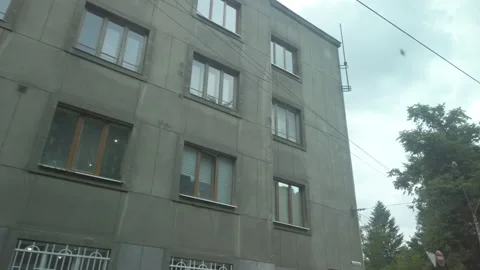 View of the old grey panel house from the window of moving public transport. Stock-Footage 145991575