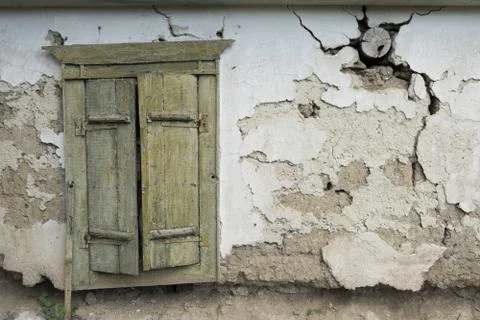 View of an old house with shutter window Stock Photos