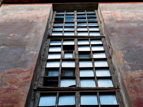 View of the old long window of the house Stock Photos