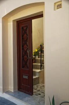 A view of old open door inviting to look inside Stock Photos