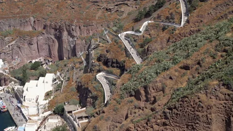 View on old port, donkey road and cableway in Thira town on santorini island 스톡 동영상 142114014