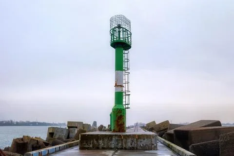 View of the old rusted metal lighthouse on the Vistula Spit on the Baltic S.. Stock Photos
