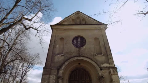 View of an old stone church. Background of blue sky Video stock 253223569