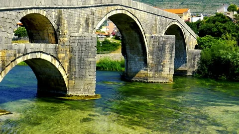 A view to the old stone made bridge from Ottoman era Video stock 145426270