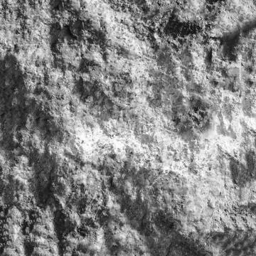 View of an old stone wall damaged by time. Stock Photos