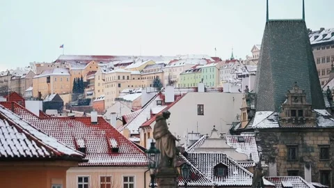 View of the old town of Prague in winter. Many towers and roofs in the snow. Stock Footage 146812524