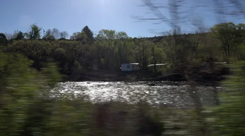 View from old train trees river sun flare HD 112 Stock Footage 38535577