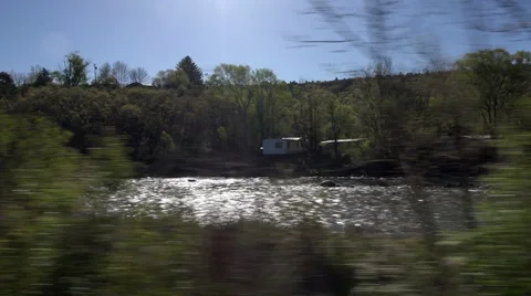 View from old train trees river sun flare 4K 112 Stock Footage 41488388