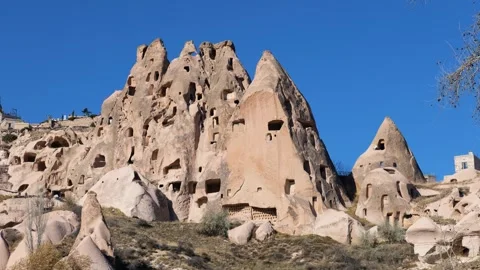 View of an old troglodyte settlement in Uchisar. Travel concept for Cappadocia Stock Footage 262650182