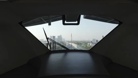 View onboard automatic monorail at front window view while traveling throug.. Видео 329677282